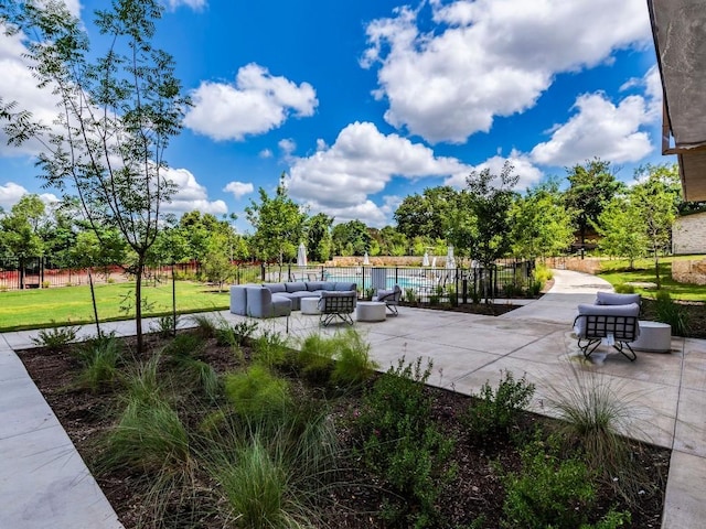 4802 S Congress Ave Unit 310, Austin, TX 78745 - view of home's community featuring a patio and an outdoor hangout area