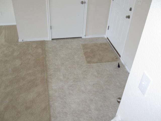 6708 Ferrystone Pass, Del Valle, TX 78617 - unfurnished room with light tile patterned floors