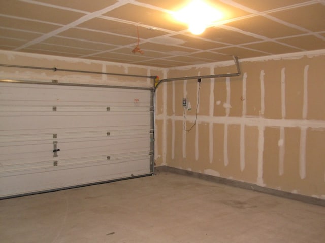 6708 Ferrystone Pass, Del Valle, TX 78617 - garage featuring baseboards