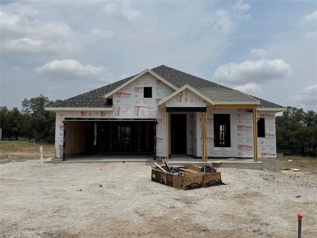 810 Sage Thrasher Cir, Dripping Springs, TX 78620 - property under construction featuring driveway and an attached garage
