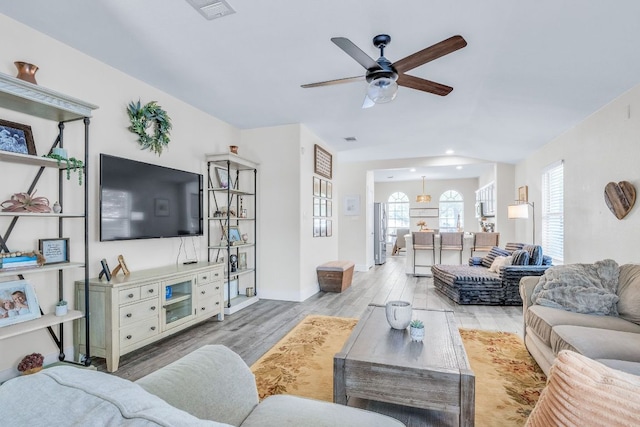 1918 Sand Creek Rd, Cedar Park, TX 78613 - living room featuring ceiling fan, light wood finished floors, baseboards, and recessed lighting