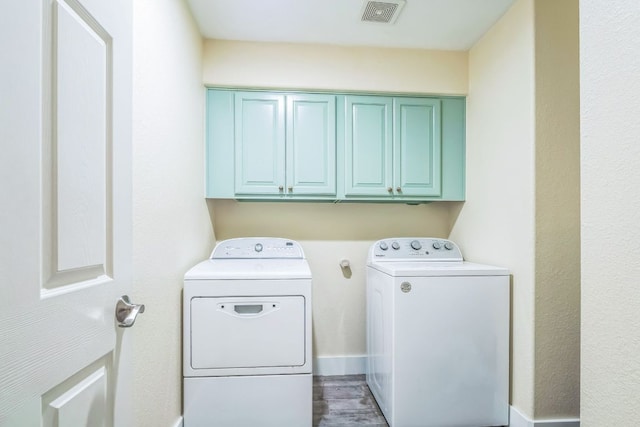 1918 Sand Creek Rd, Cedar Park, TX 78613 - washroom featuring washing machine and clothes dryer and cabinet space