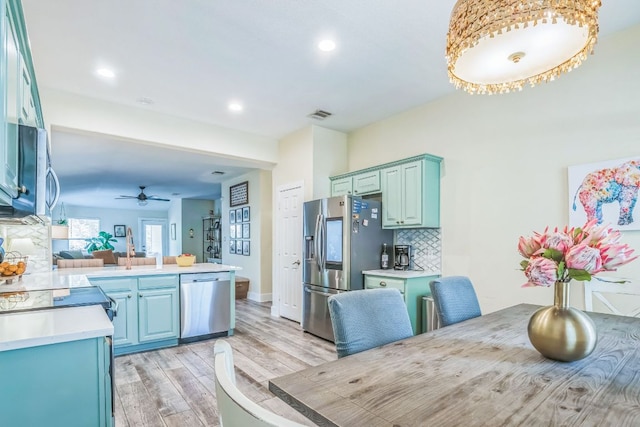 1918 Sand Creek Rd, Cedar Park, TX 78613 - dining room featuring light wood-type flooring, recessed lighting, and a ceiling fan