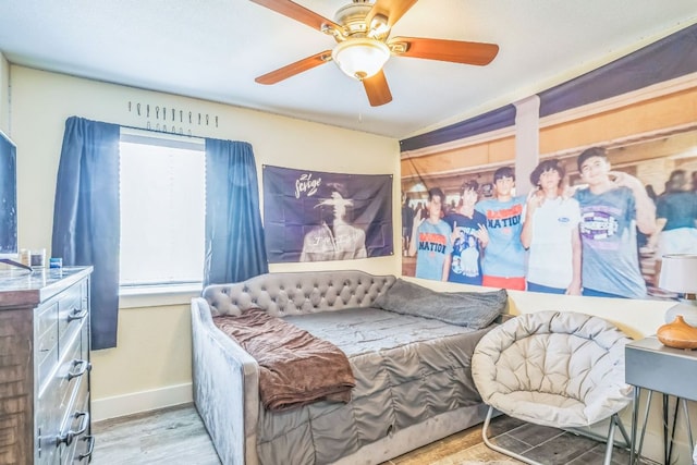 1918 Sand Creek Rd, Cedar Park, TX 78613 - bedroom with wood finished floors, baseboards, and ceiling fan