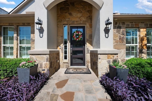 5700 Cherokee Draw Rd, Austin, TX 78738 - property entrance with stone siding and stucco siding