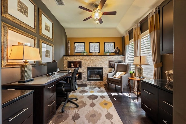 5700 Cherokee Draw Rd, Austin, TX 78738 - office featuring a ceiling fan, dark wood-style floors, and a fireplace