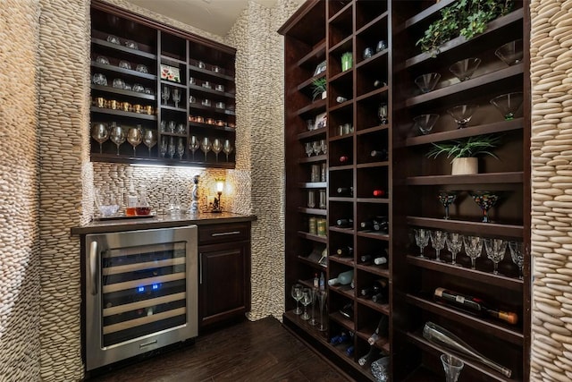 5700 Cherokee Draw Rd, Austin, TX 78738 - wine room with wine cooler, bar, and dark wood-style floors