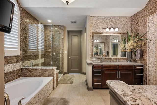 5700 Cherokee Draw Rd, Austin, TX 78738 - bathroom featuring a shower stall, a garden tub, and vanity
