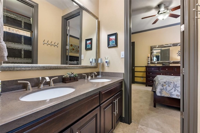 5700 Cherokee Draw Rd, Austin, TX 78738 - ensuite bathroom featuring double vanity, a ceiling fan, and crown molding