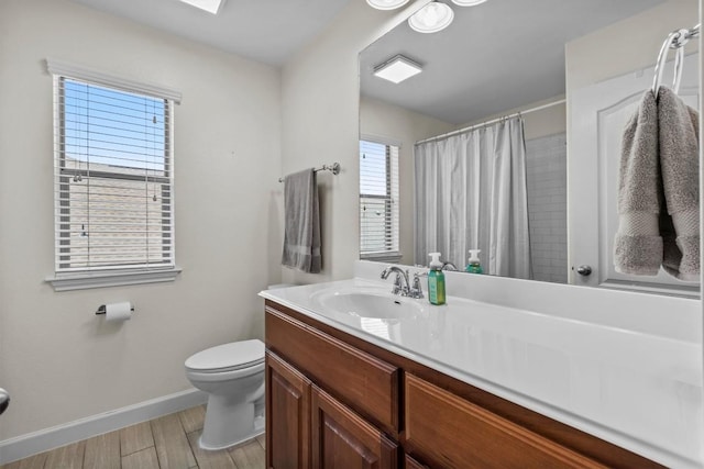 2700 Outlook Ridge Loop, Leander, TX 78641 - full bathroom with wood finished floors, vanity, and a shower with curtain