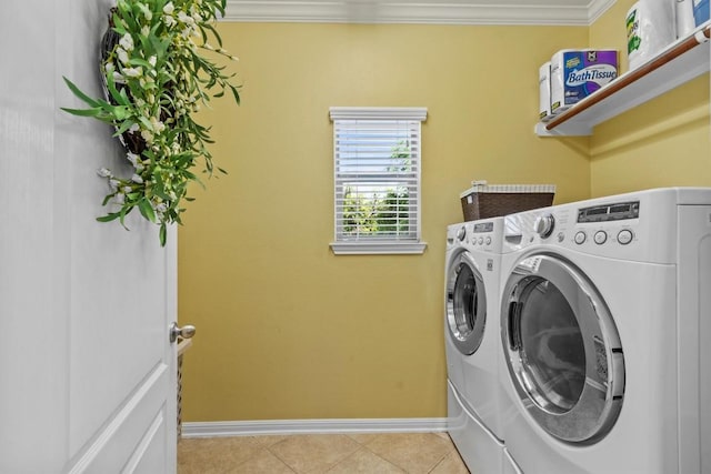 2700 Outlook Ridge Loop, Leander, TX 78641 - laundry room featuring independent washer and dryer, ornamental molding, and light tile patterned flooring
