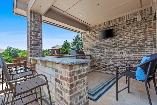 2700 Outlook Ridge Loop, Leander, TX 78641 - view of patio / terrace featuring area for grilling and exterior bar