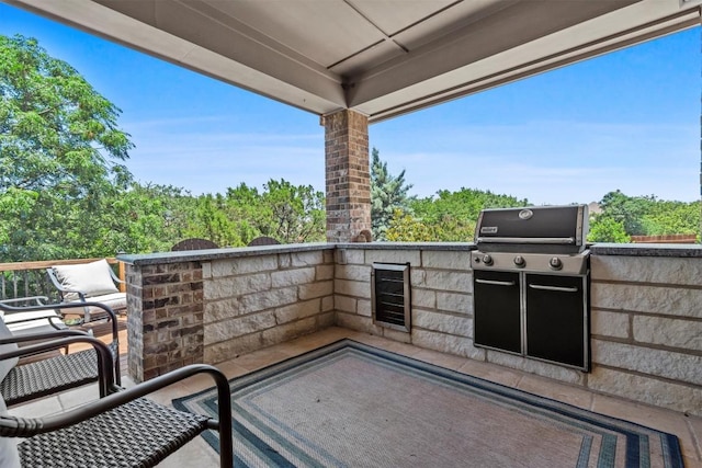 2700 Outlook Ridge Loop, Leander, TX 78641 - view of patio / terrace with area for grilling and wine cooler