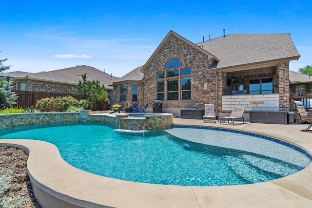 2700 Outlook Ridge Loop, Leander, TX 78641 - view of pool featuring a patio, a fenced backyard, and a pool with connected hot tub
