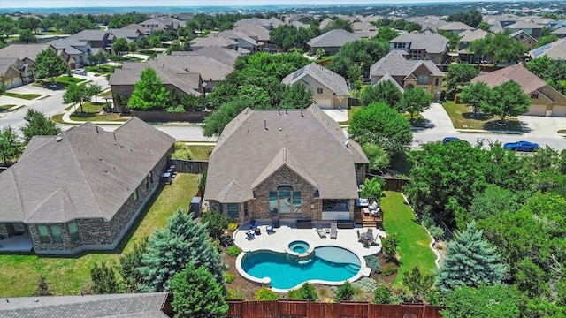 2700 Outlook Ridge Loop, Leander, TX 78641 - aerial perspective of suburban area with a pool area