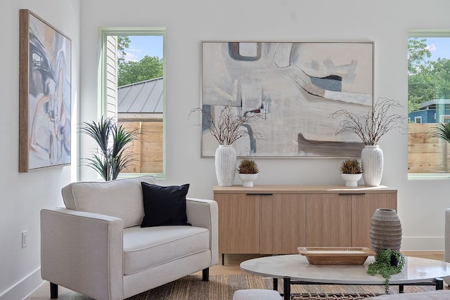 6410 Cannonleague Dr Unit 1, Austin, TX 78745 - sitting room with plenty of natural light, baseboards, and wood finished floors