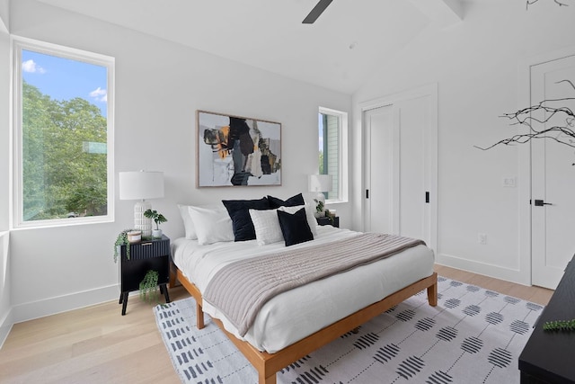 6410 Cannonleague Dr Unit 1, Austin, TX 78745 - bedroom featuring light wood-type flooring, baseboards, lofted ceiling, a ceiling fan, and a closet