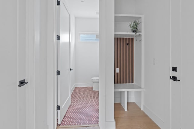 6410 Cannonleague Dr Unit 1, Austin, TX 78745 - hall featuring baseboards and light wood-style flooring
