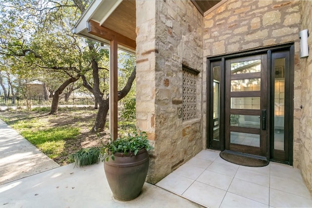 165 Highridge Ln, Fredericksburg, TX 78624 - view of exterior entry featuring stone siding