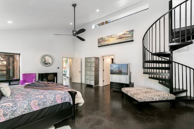 165 Highridge Ln, Fredericksburg, TX 78624 - bedroom featuring concrete flooring, a towering ceiling, and recessed lighting