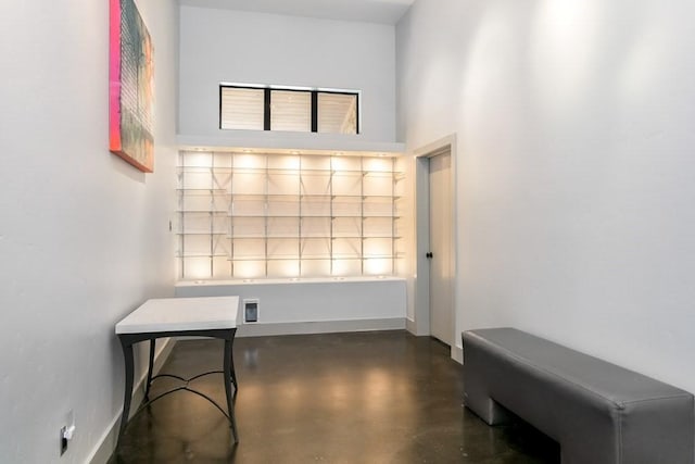 165 Highridge Ln, Fredericksburg, TX 78624 - corridor with concrete floors and baseboards