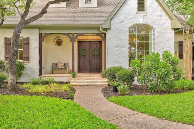 9301 San Lucas Dr, Austin, TX 78737 - property entrance featuring a shingled roof and stucco siding