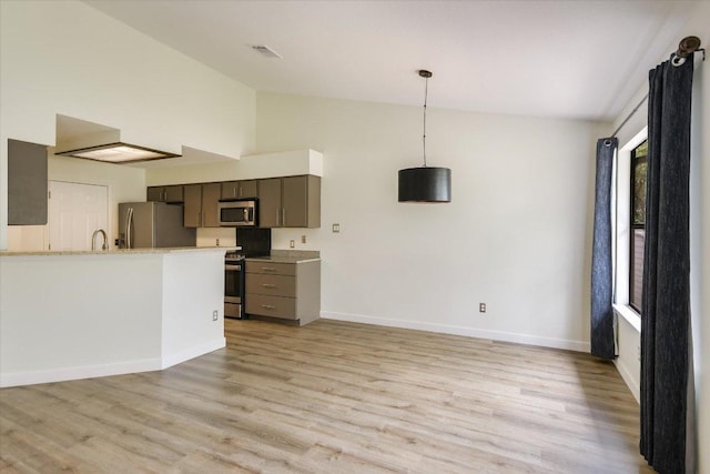 1811 Hatch Rd, Cedar Park, TX 78613 - kitchen with appliances with stainless steel finishes, baseboards, light wood-style floors, light countertops, and high vaulted ceiling