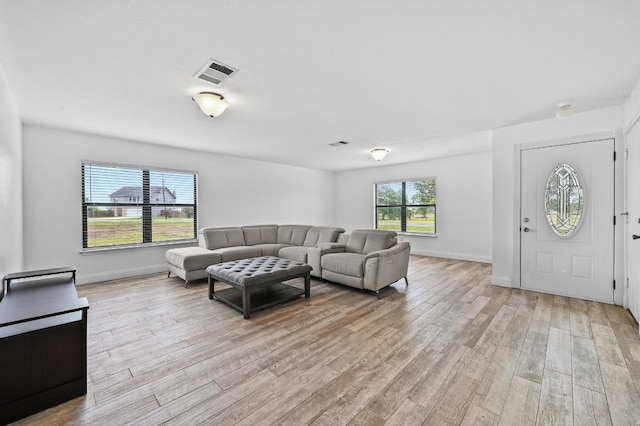 585 Siebert Dr, Kyle, TX 78640 - living room with light wood-type flooring and baseboards