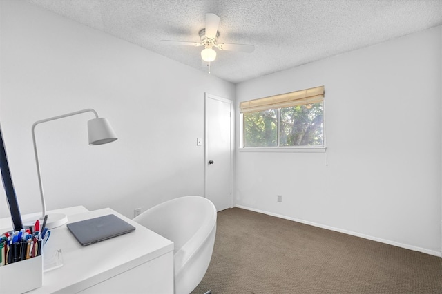 3104 Rexford Dr, Austin, TX 78723 - carpeted office space featuring a textured ceiling, ceiling fan, and baseboards