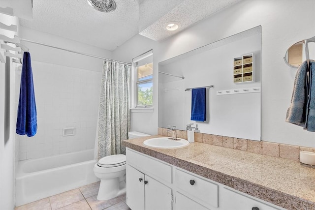 3104 Rexford Dr, Austin, TX 78723 - bathroom with toilet, shower / tub combo with curtain, vanity, tile patterned floors, and a textured ceiling