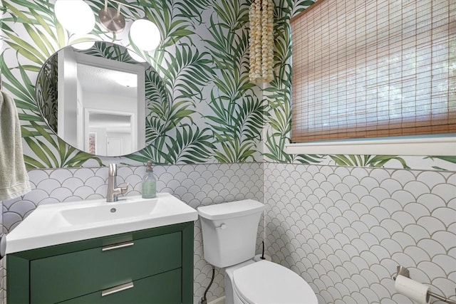3104 Rexford Dr, Austin, TX 78723 - half bathroom featuring vanity and wallpapered walls