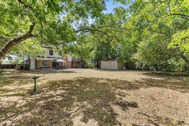 3104 Rexford Dr, Austin, TX 78723 - view of yard with a shed