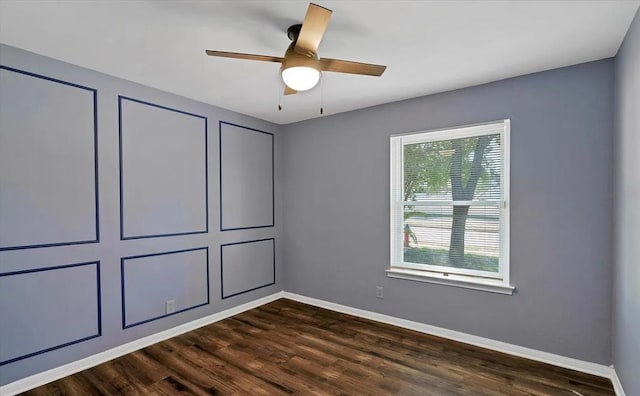 1709 Greenlawn Blvd, Round Rock, TX 78664 - unfurnished bedroom with dark wood-type flooring, baseboards, and ceiling fan
