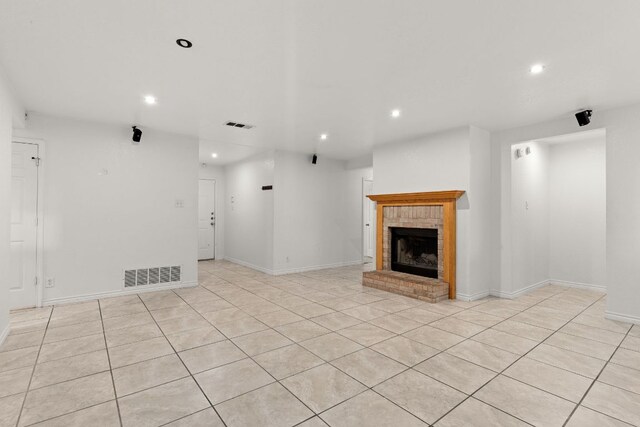 3809 Joshua Taylor Dr, Killeen, TX 76549 - unfurnished living room with recessed lighting, a fireplace, baseboards, and light tile patterned floors