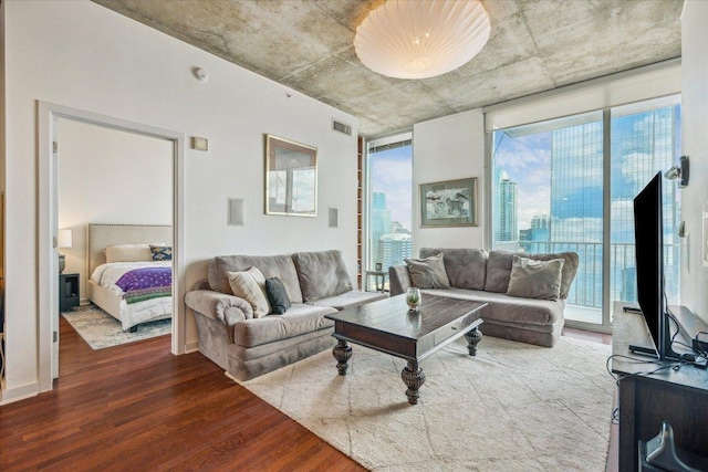 360 Nueces St Unit 3309, Austin, TX 78701 - living area featuring wood finished floors and healthy amount of natural light