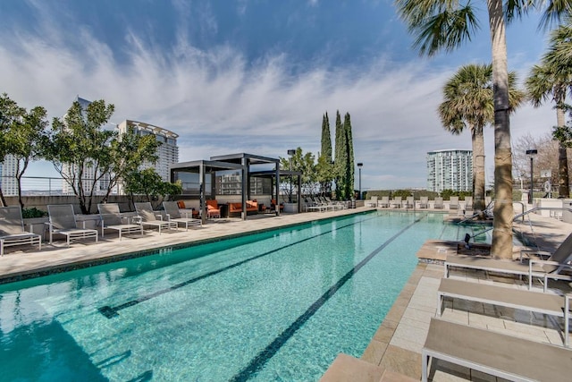 360 Nueces St Unit 3309, Austin, TX 78701 - community pool featuring a patio area and an outdoor hangout area