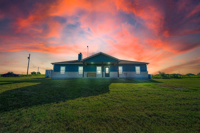 200 County Road 358, Granger, TX 76530 - view of front of house with a chimney and a lawn