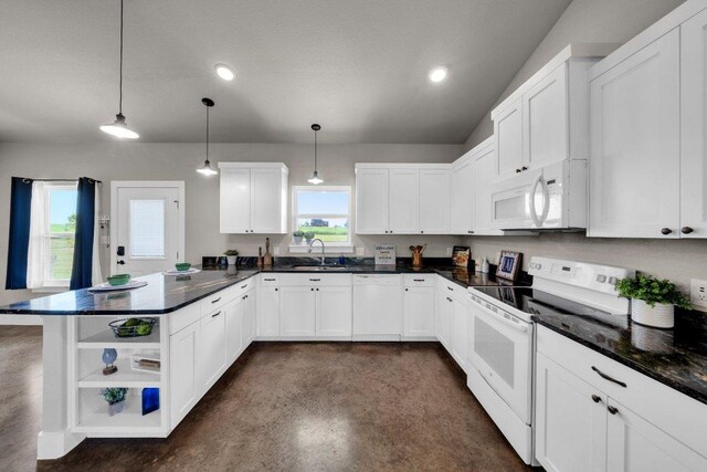 200 County Road 358, Granger, TX 76530 - kitchen featuring white appliances, a sink, open shelves, finished concrete floors, and a peninsula