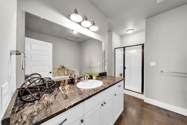 200 County Road 358, Granger, TX 76530 - bathroom with a stall shower, vanity, finished concrete floors, baseboards, and a bath