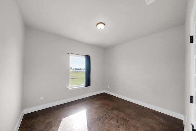 200 County Road 358, Granger, TX 76530 - unfurnished room with baseboards and finished concrete floors
