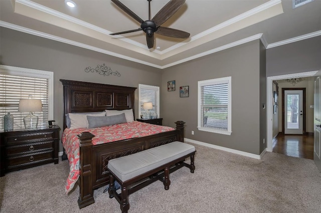 2543 Fm 975, Caldwell, TX 77836 - bedroom with a tray ceiling, ornamental molding, carpet floors, baseboards, and a ceiling fan