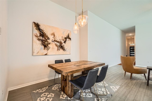 267 Razzmatazz Trl, Buda, TX 78610 - dining space featuring wood finished floors and baseboards