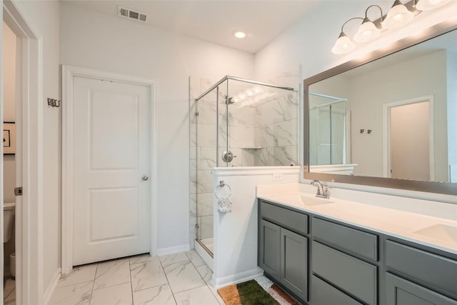 267 Razzmatazz Trl, Buda, TX 78610 - full bathroom with marble look tiles, toilet, a stall shower, double vanity, and recessed lighting