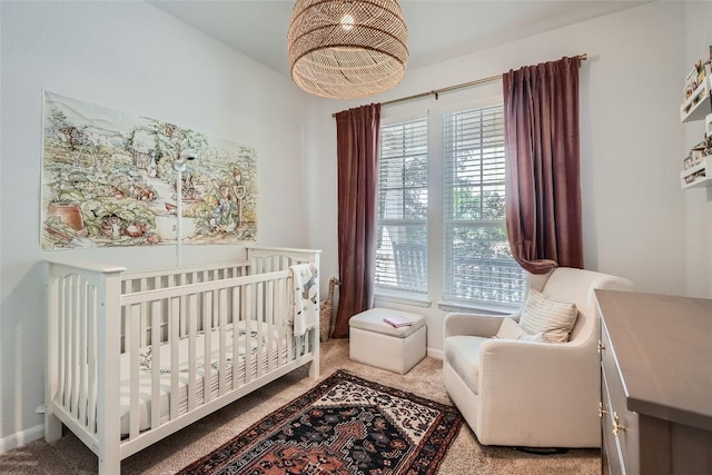 267 Razzmatazz Trl, Buda, TX 78610 - carpeted bedroom with multiple windows, a nursery area, and baseboards