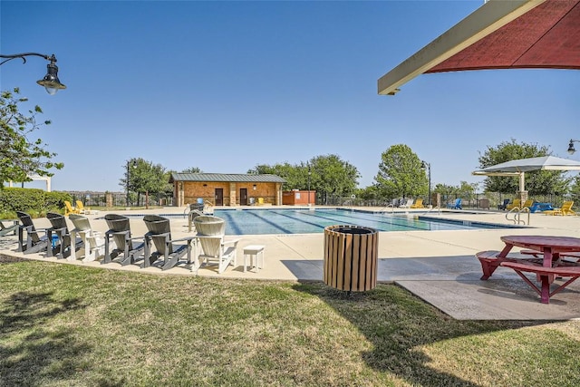 267 Razzmatazz Trl, Buda, TX 78610 - community pool with a patio