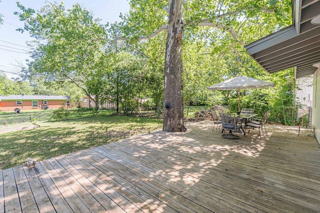 4714 Philco Dr, Austin, TX 78745 - wooden deck featuring outdoor dining area and a fenced backyard
