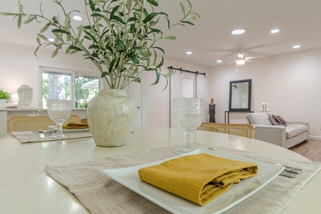 4714 Philco Dr, Austin, TX 78745 - kitchen featuring a barn door, recessed lighting, and a ceiling fan