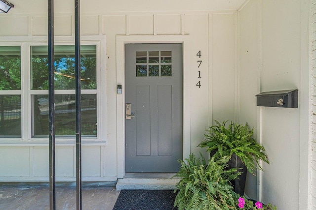 4714 Philco Dr, Austin, TX 78745 - doorway to property featuring board and batten siding