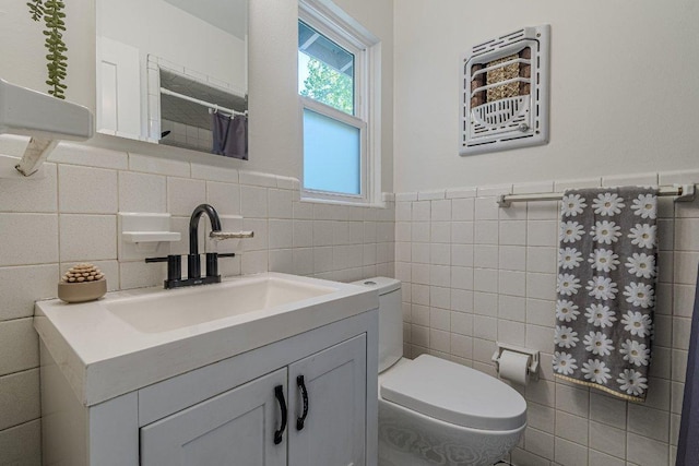 4714 Philco Dr, Austin, TX 78745 - bathroom featuring tile walls, vanity, wainscoting, and a shower with shower curtain