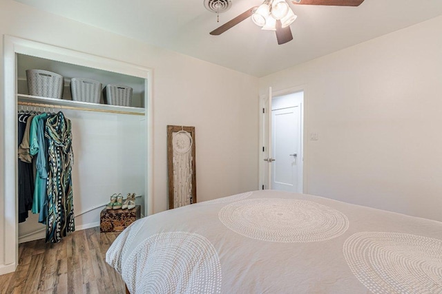 4714 Philco Dr, Austin, TX 78745 - bedroom with wood finished floors, a closet, and a ceiling fan